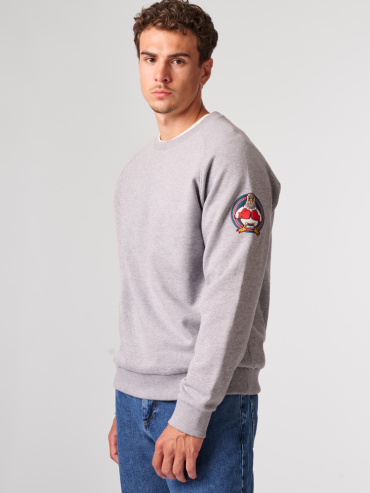 Sweater effen met boksduif op mouw 204 grey chiné