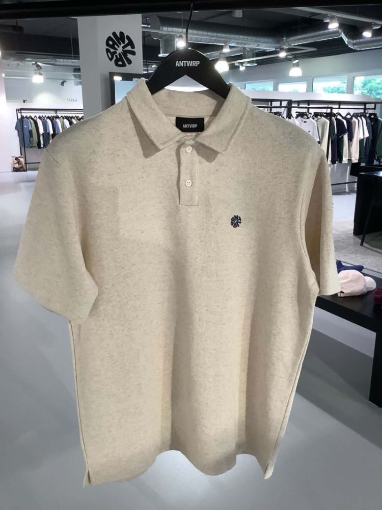 Polo gemeleerd met klein cirkelborstlogo 122 ecru